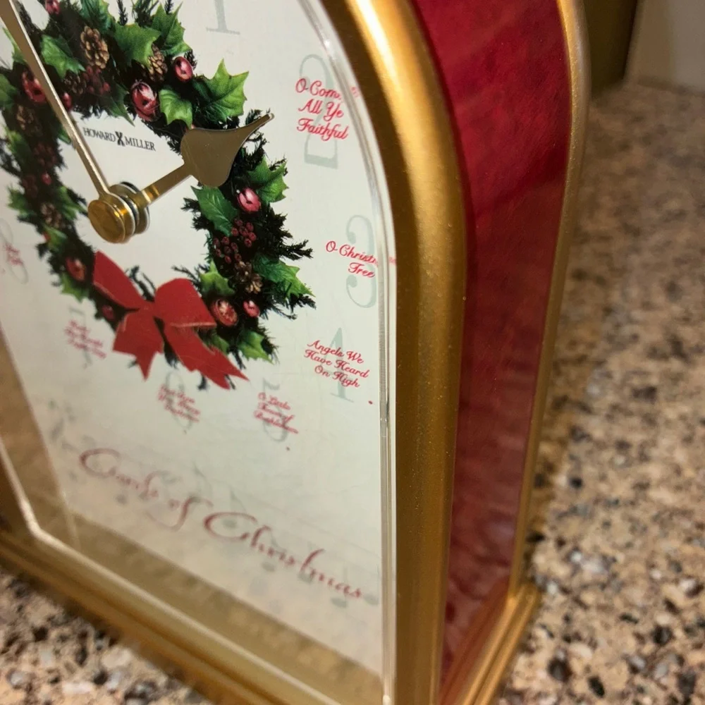 Red and Gold Christmas Howard Miller Clock.  Listen to video.